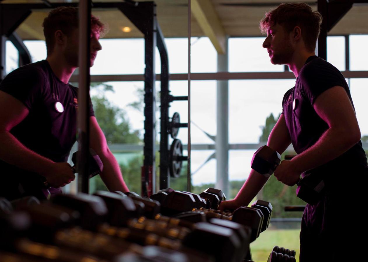 Castlemartyr Resort Hotel Exteriör bild Personal trainer with a client