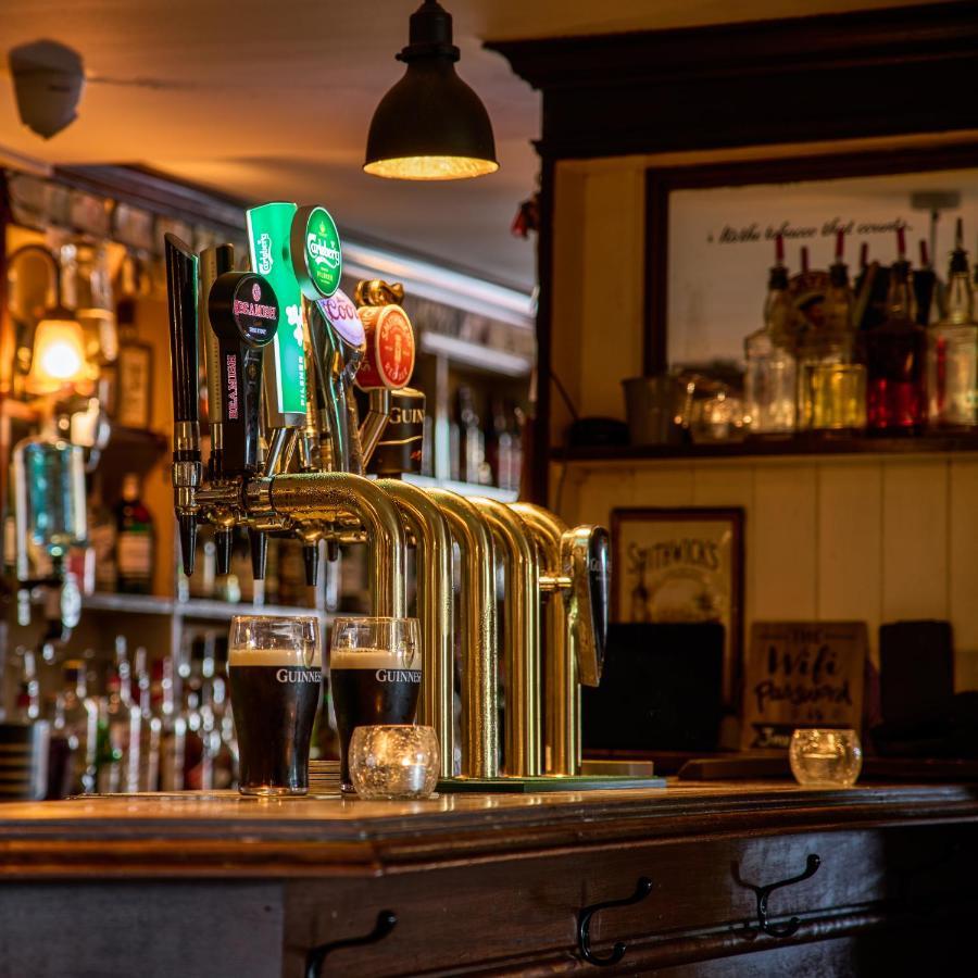 Castlemartyr Resort Hotel Exteriör bild Beer taps in a pub