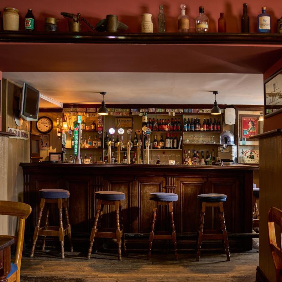 Castlemartyr Resort Hotel Exteriör bild The bar at The Old Red Lion