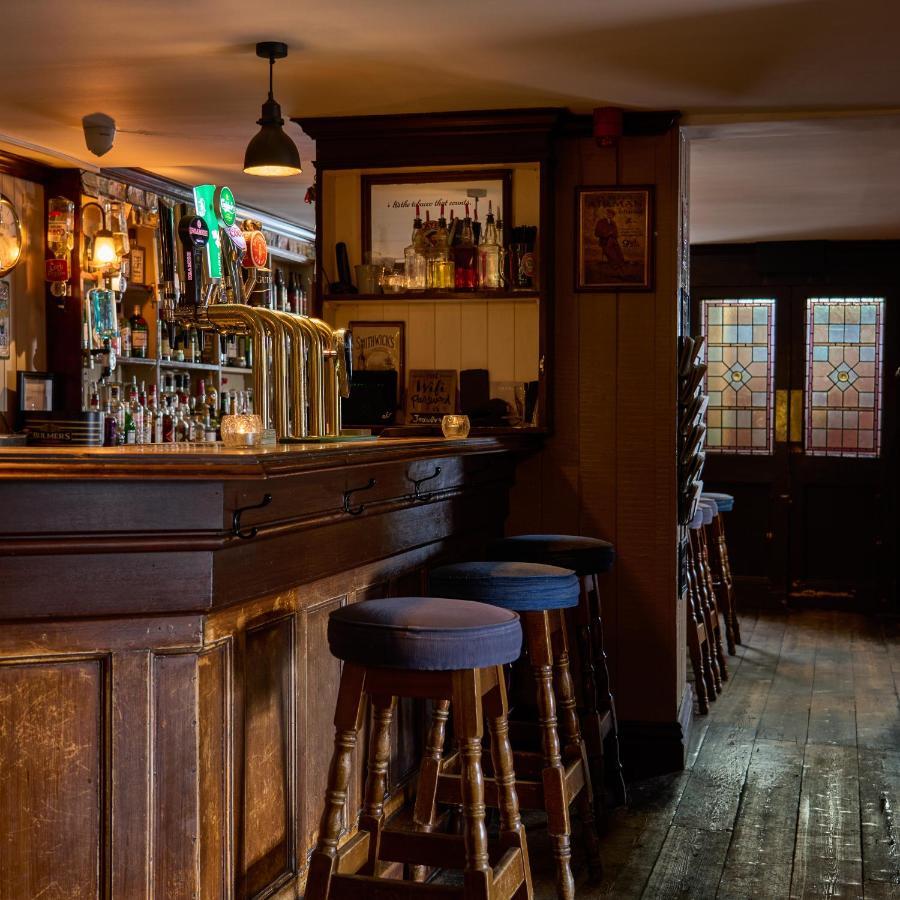 Castlemartyr Resort Hotel Exteriör bild The bar at The Old Red Lion